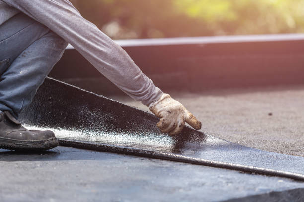Professional Basement Waterproofing technician working in Belfast, NY